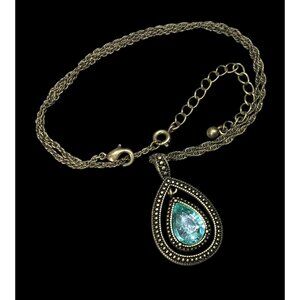 Whimsical Teardrop Blue Gemmed Gold Tone Pendant Necklace